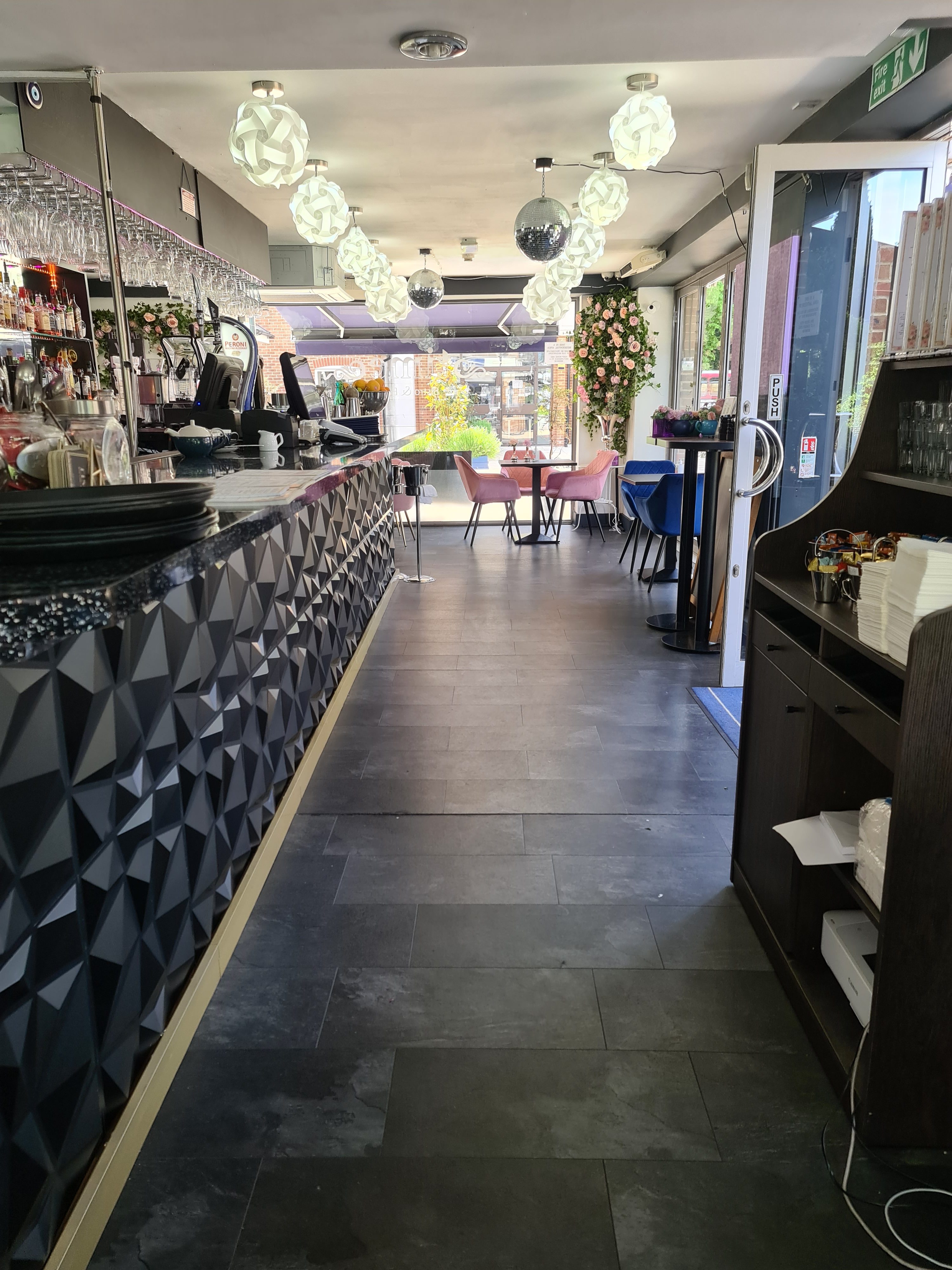 Modern Aqua Vista Bistro Bar with geometric bar design, perfect for networking events.