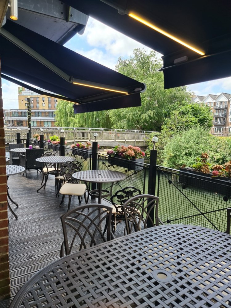 Outdoor terrace at Aqua Vista Bistro Bar, perfect for intimate gatherings and networking events.