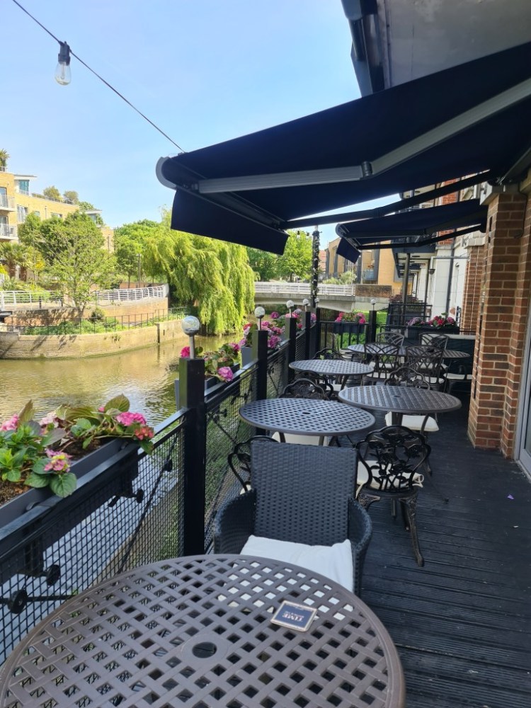 Outdoor terrace at Aqua Vista Bistro Bar, ideal for gatherings and networking events.