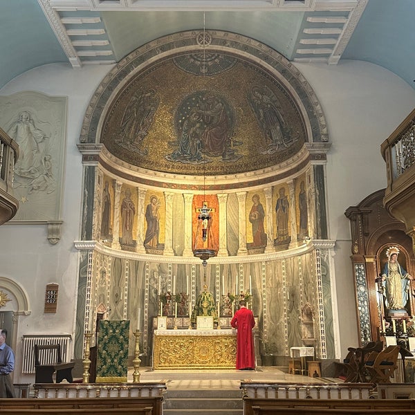 "Intricate altar at Our Lady of the Assumption Church for weddings and events."