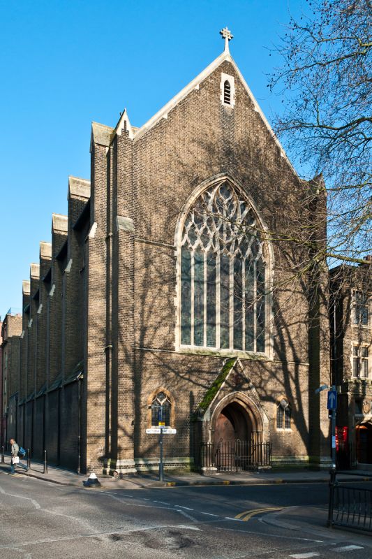 Ornate stained glass window in Our Lady of the Assumption Church Hall for weddings and events.