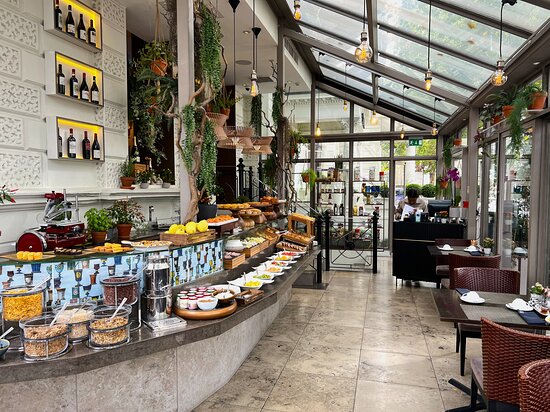 Buffet setup in bright La Terrazza venue, perfect for events and gatherings.