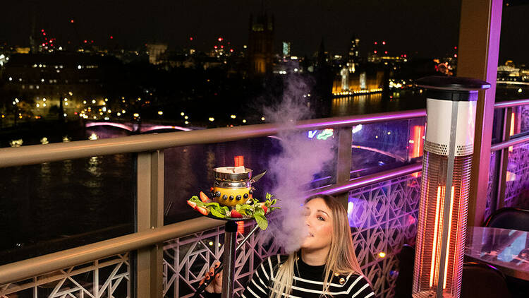 Vibrant rooftop venue at Shisha Terrace, London, perfect for evening events and parties.