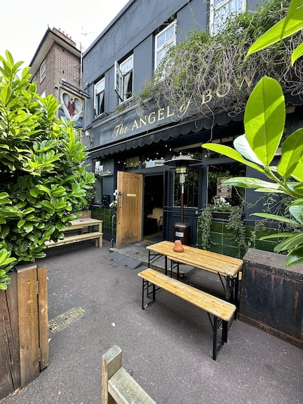 Charming outdoor restaurant venue with rustic seating for casual gatherings and events.