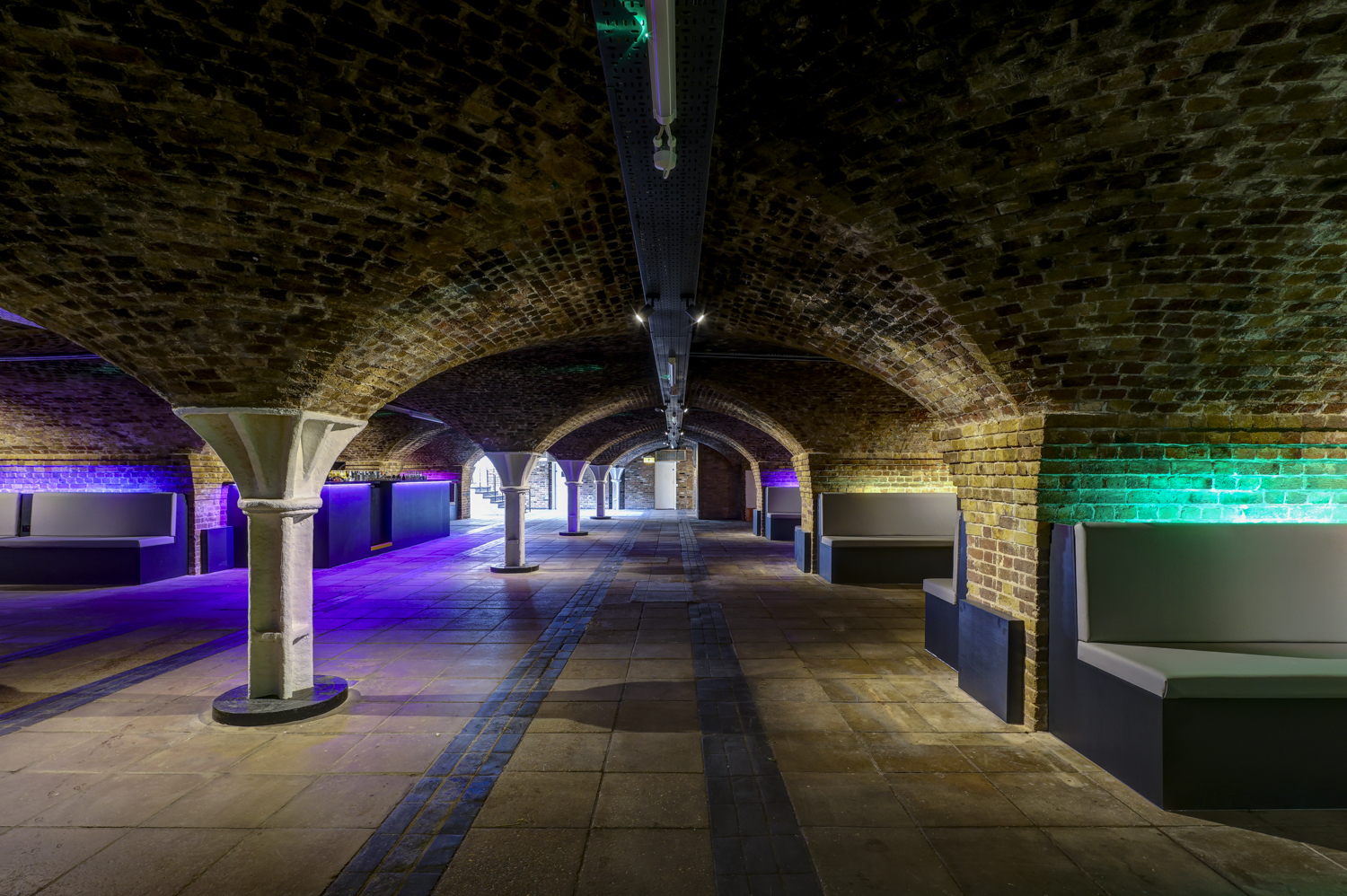 Princess Diana Exhibition at Dockside Vaults with exposed brick arches, versatile event space.