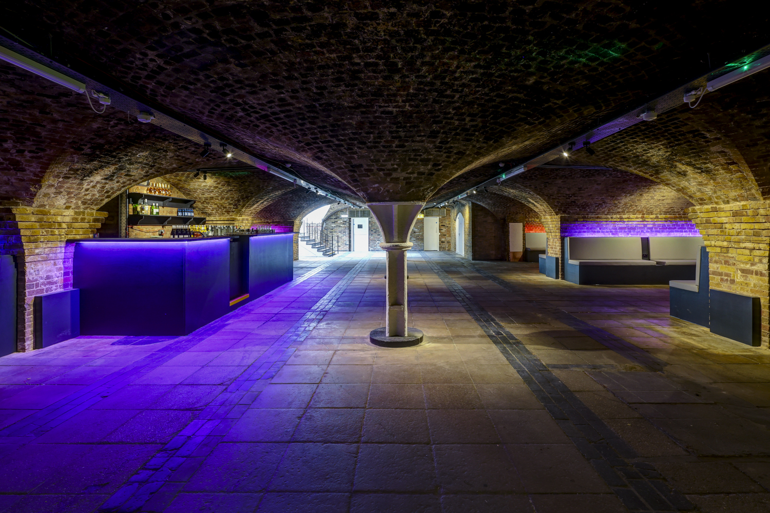 Princess Diana Exhibition at Dockside Vaults, featuring exposed brick arches for events.