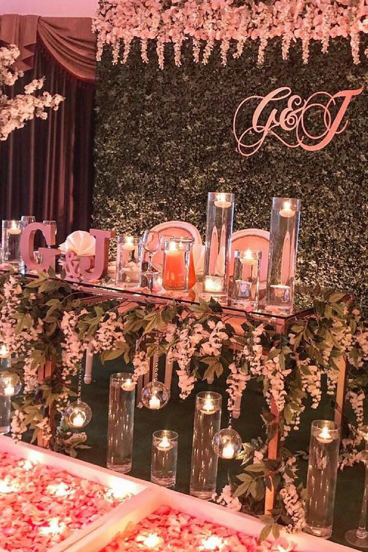 Elegant event table with glassware and greenery in Mya Events Mandaps. Perfect for celebrations.