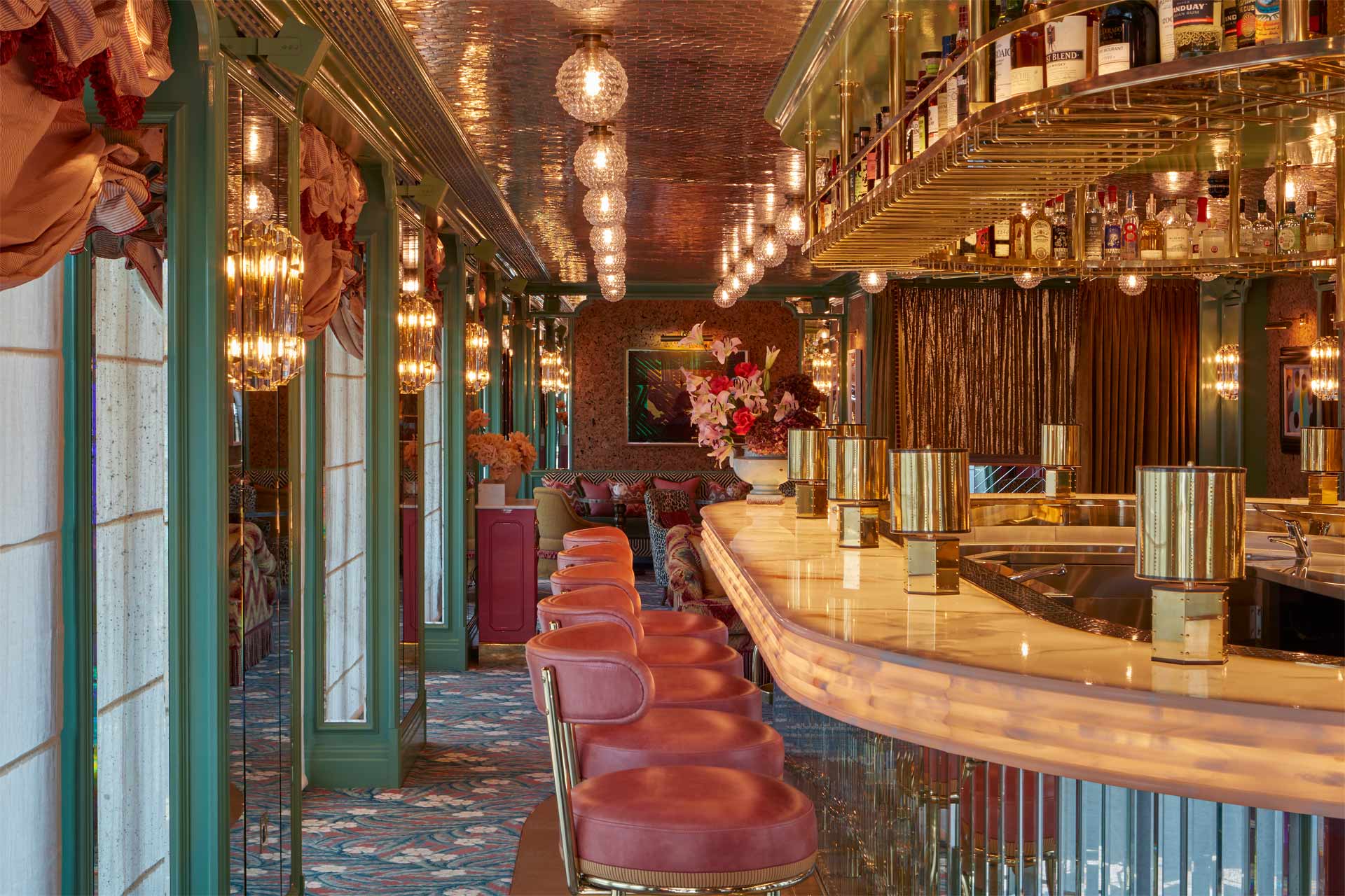 Stylish bar area with plush seating, perfect for networking events and cocktail receptions.