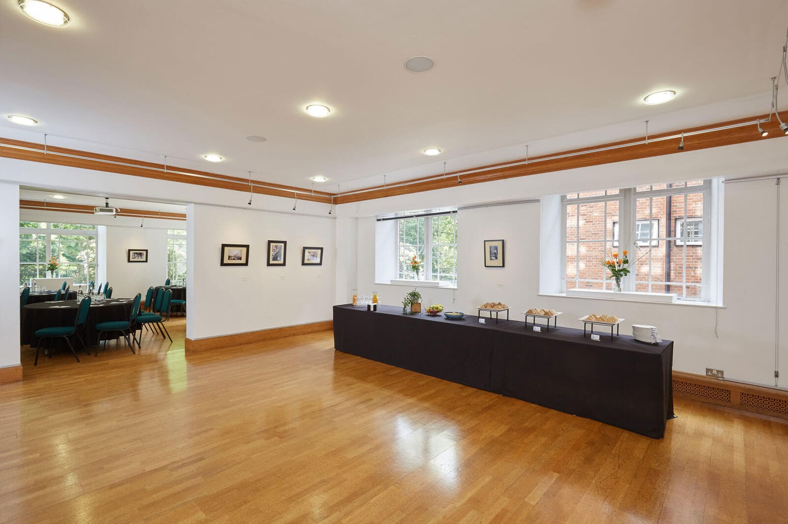 Knapp Gallery event space with polished wooden floors, ideal for meetings and gatherings.