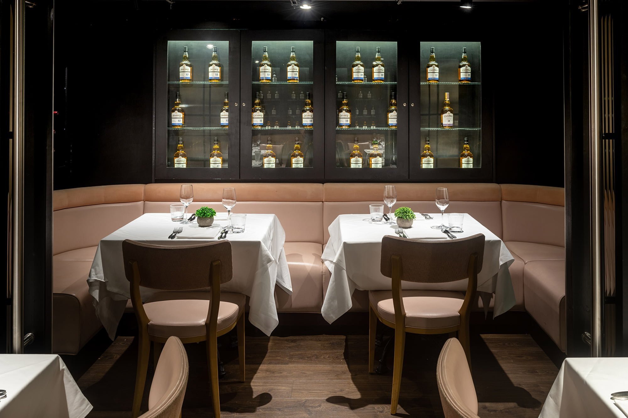 Private dining room at Manjal Restaurant, elegant decor for intimate events and meetings.