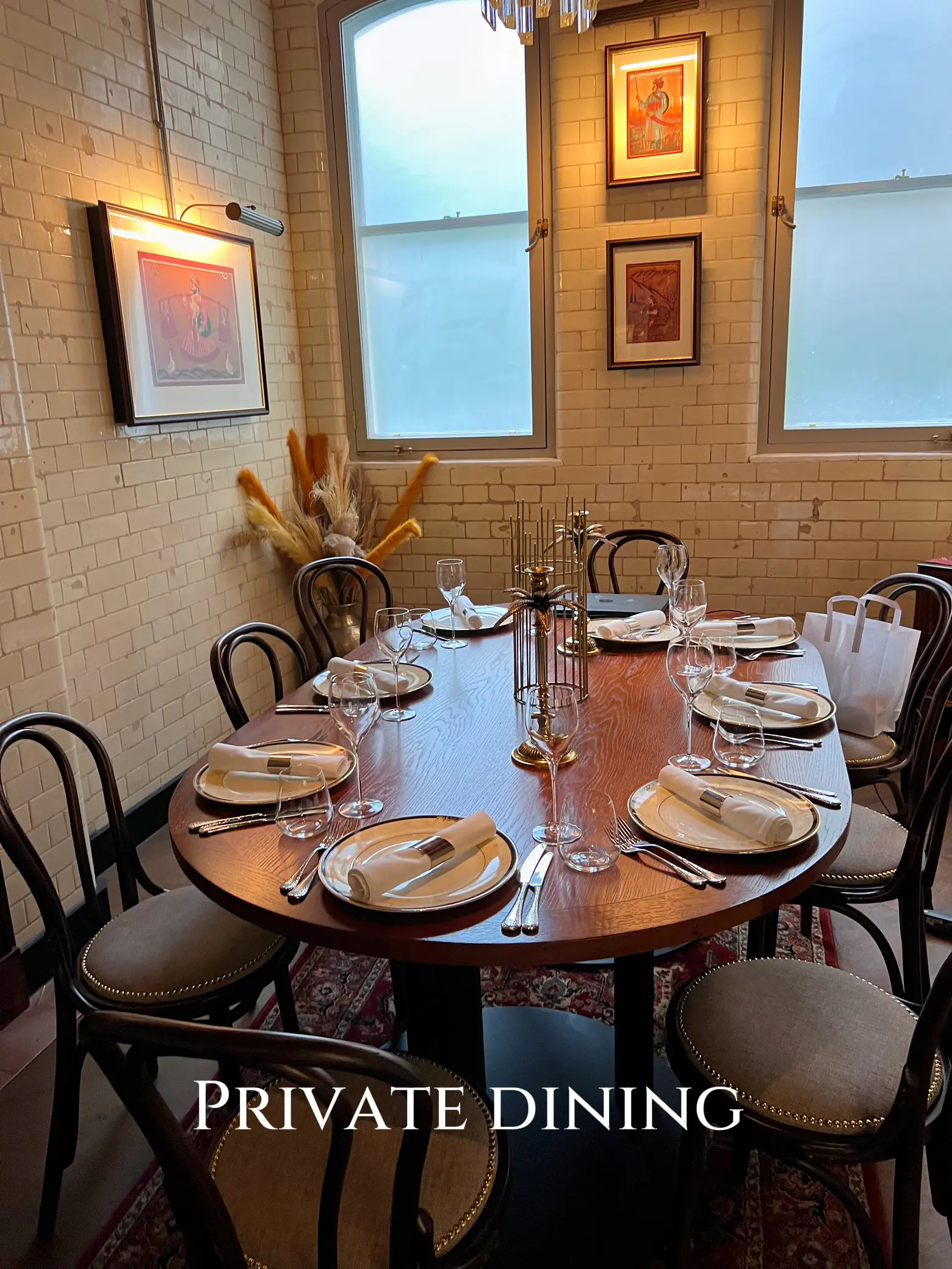Private dining room with elegant table settings for intimate events at Manjal Restaurant.