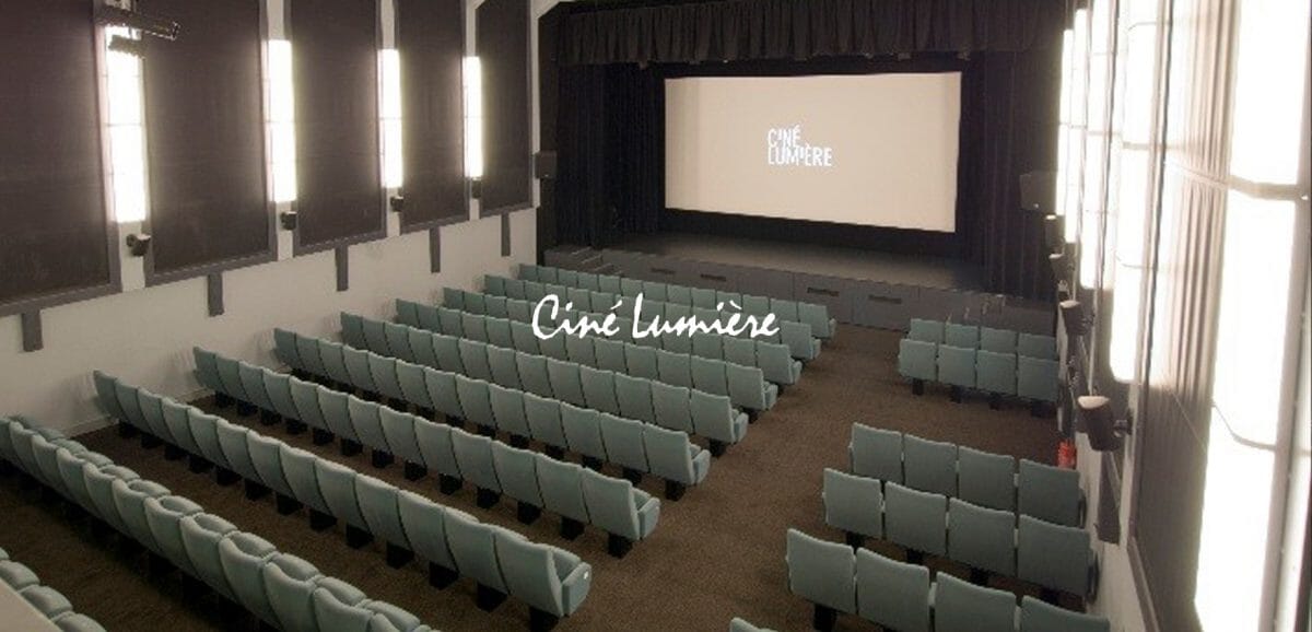 Ciné Lumière cinema with tiered seating, ideal for film screenings and events.