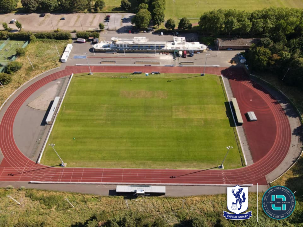 Queen Elizabeth II Stadium athletic field with running track for sports events and gatherings.
