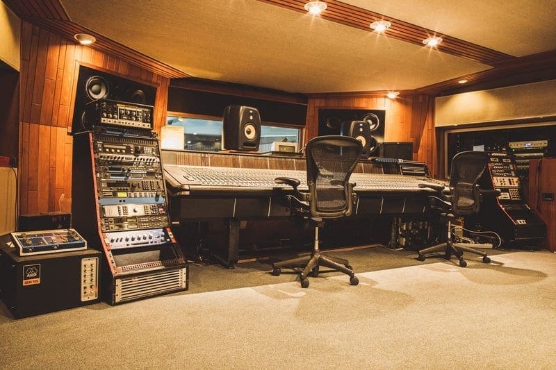 Professional recording studio with soundproofing for audio workshops and events.