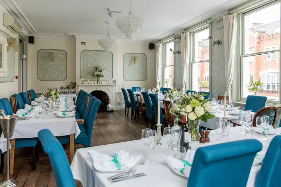 Elegant dining room at The Cooper's Arms, perfect for corporate dinners and intimate events.