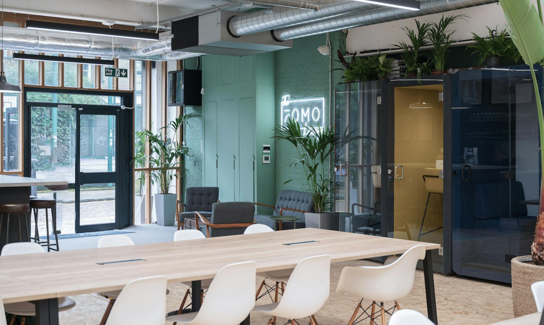 Modern meeting space at FOMO Bar & Restaurant, perfect for workshops and team meetings.