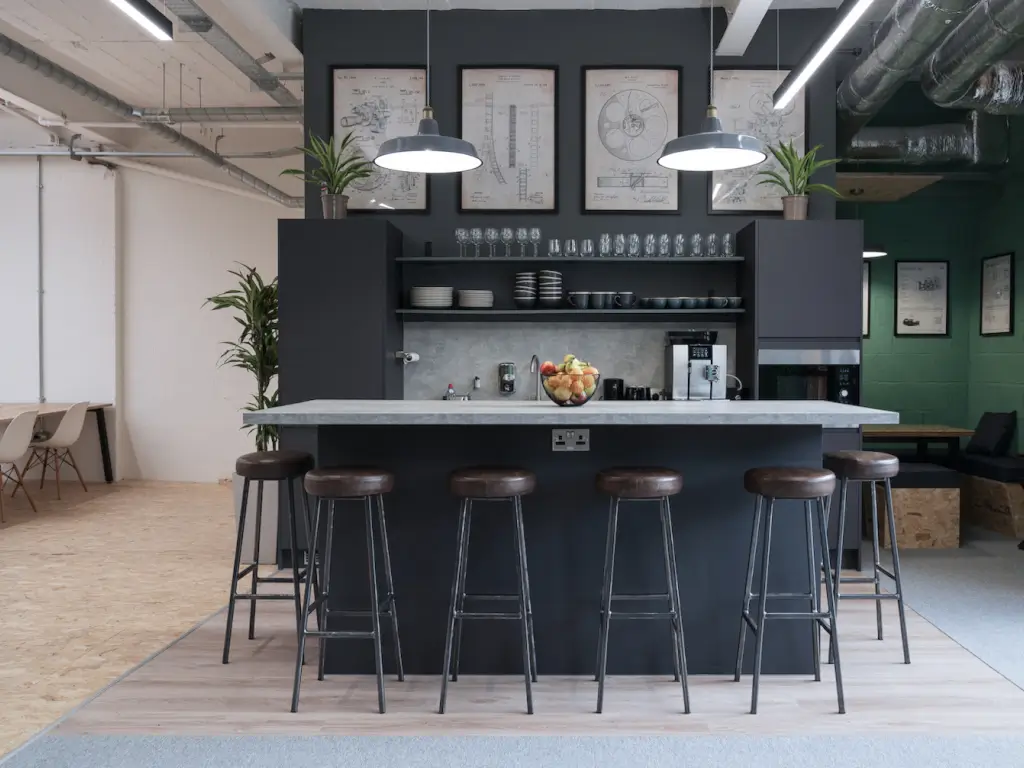 Modern break area at FOMO Bar & Restaurant, ideal for meetings and events.