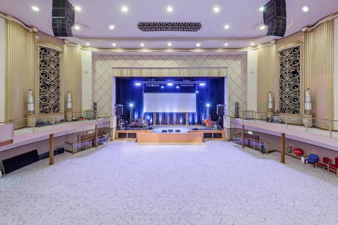 Spacious Lighthouse Theatre hall with stage, ideal for weddings and conferences.