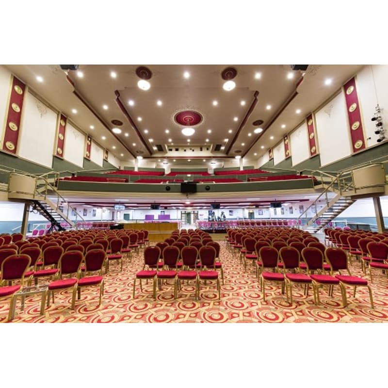 Lighthouse Theatre event venue with red seating, ideal for conferences and performances.