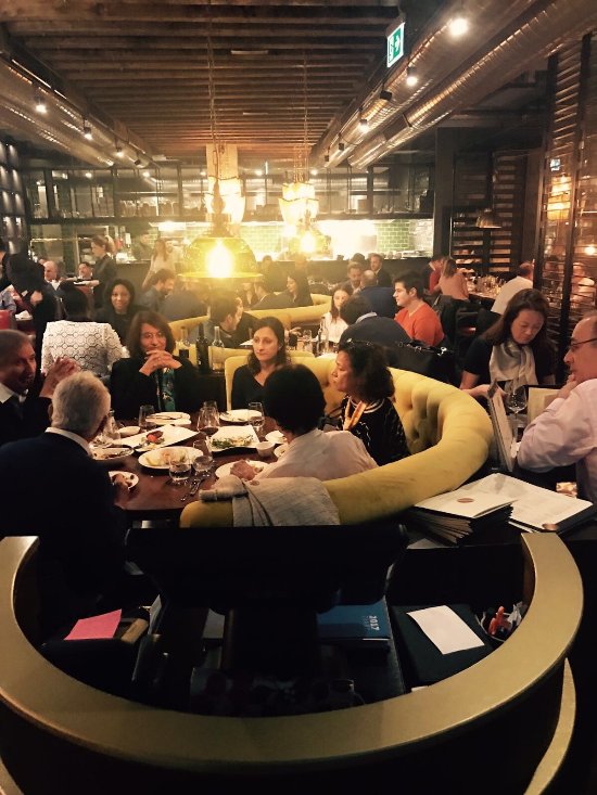 Vibrant dining area in Kibele Restaurant, perfect for networking events and gatherings.