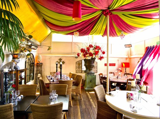 Vibrant event space at Rock & Rose Restaurant with floral decor for celebrations and corporate events.