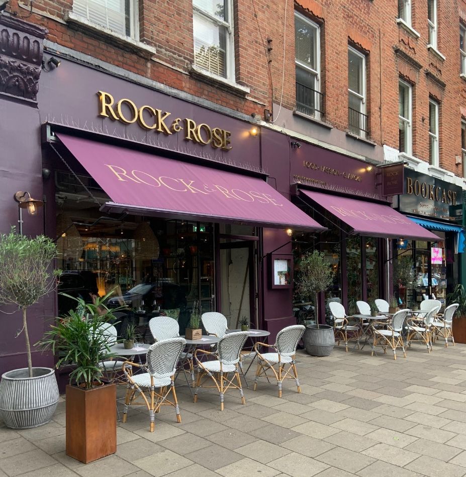 Stylish outdoor seating at Rock & Rose Restaurant for casual meetings and events.