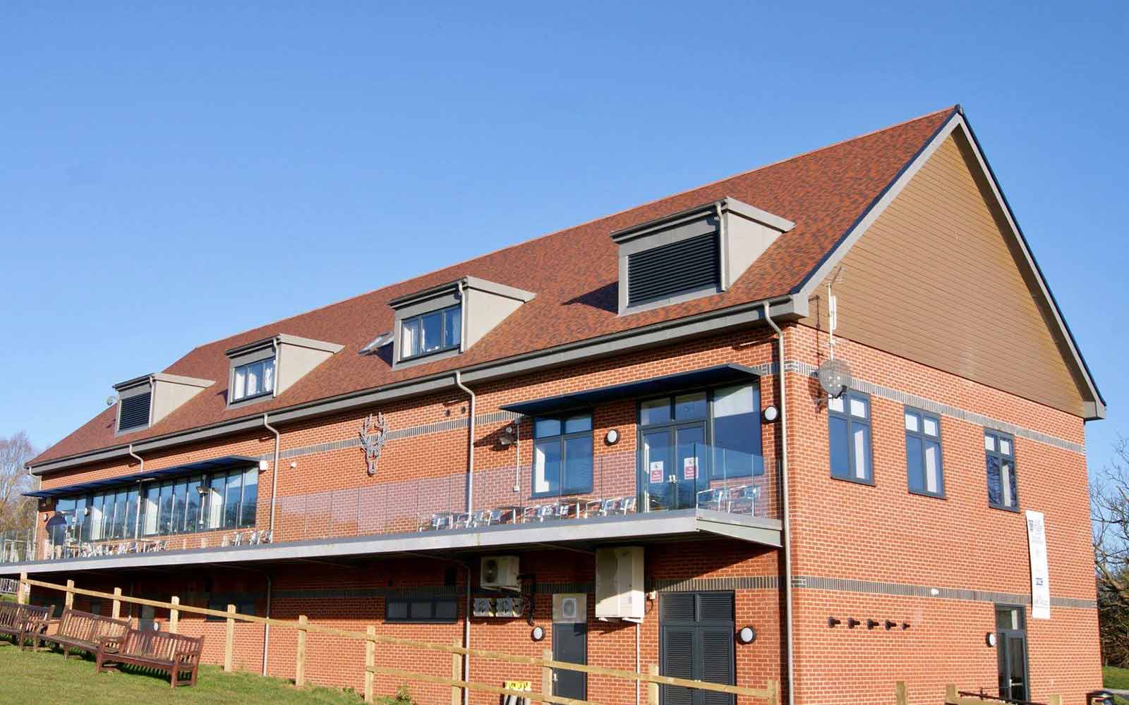 Modern Clubhouse at Rosedale Sports Club with large windows, perfect for events and meetings.