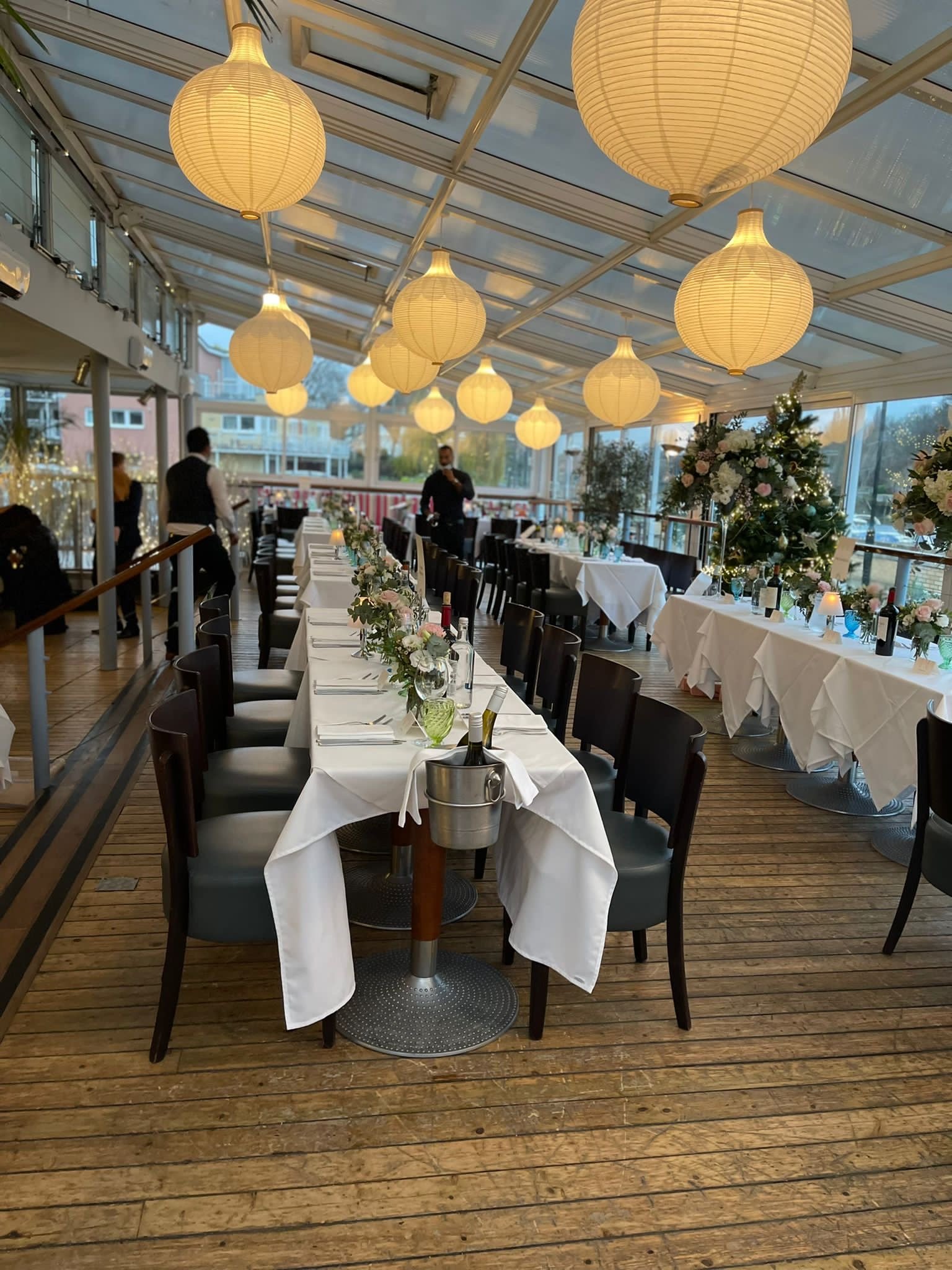 Glass-walled dining room at The Wharf Teddington, ideal for weddings and corporate events.