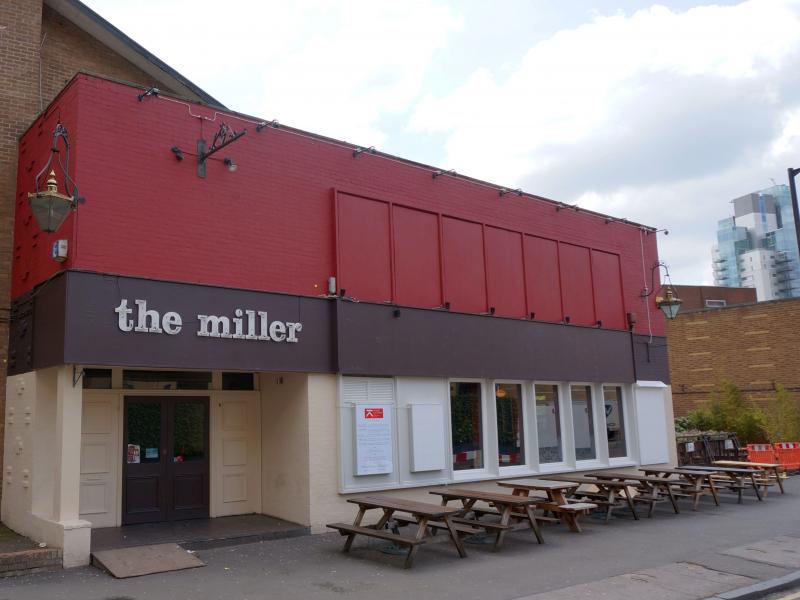 Casual event venue with outdoor seating at The Miller pub, ideal for networking.