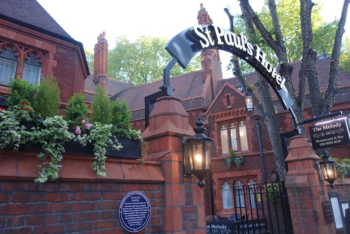 Elegant entrance of The Melody Restaurant at St. Paul's Hotel, perfect for upscale events.