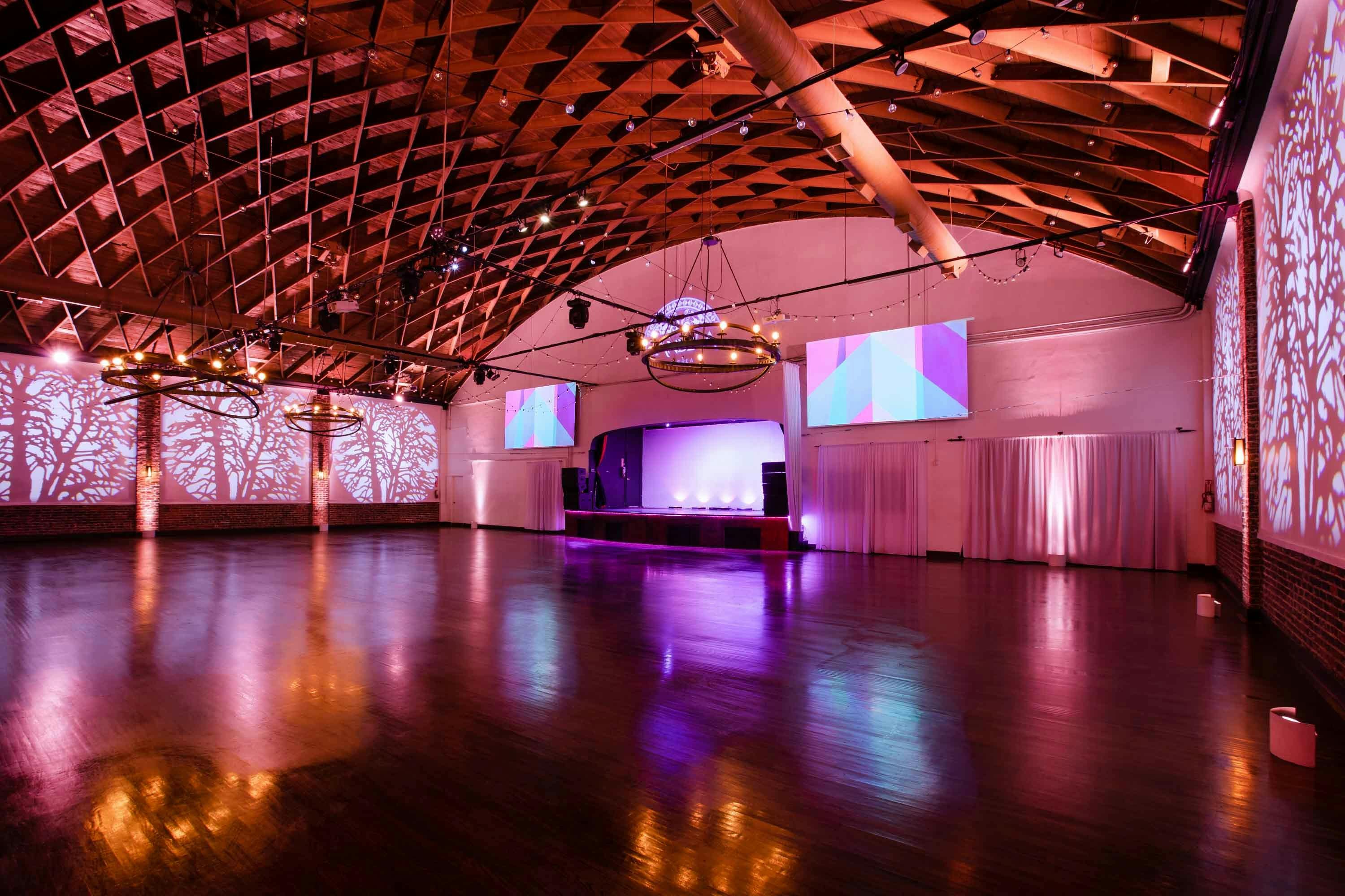 Spacious Candela La Brea venue with wooden ceiling, ideal for conferences and gala events.
