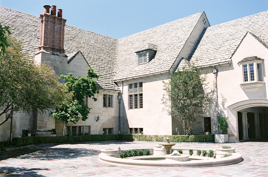 Balcony at Greystone Mansion: elegant courtyard with fountain for events and gatherings.