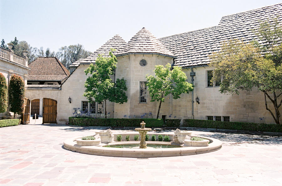 Greystone Mansion courtyard with fountain, ideal for outdoor weddings and events.