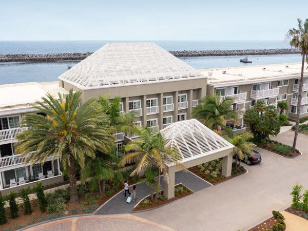Portofino Hotel & Marina: modern venue with pyramid roof for events by the waterfront.