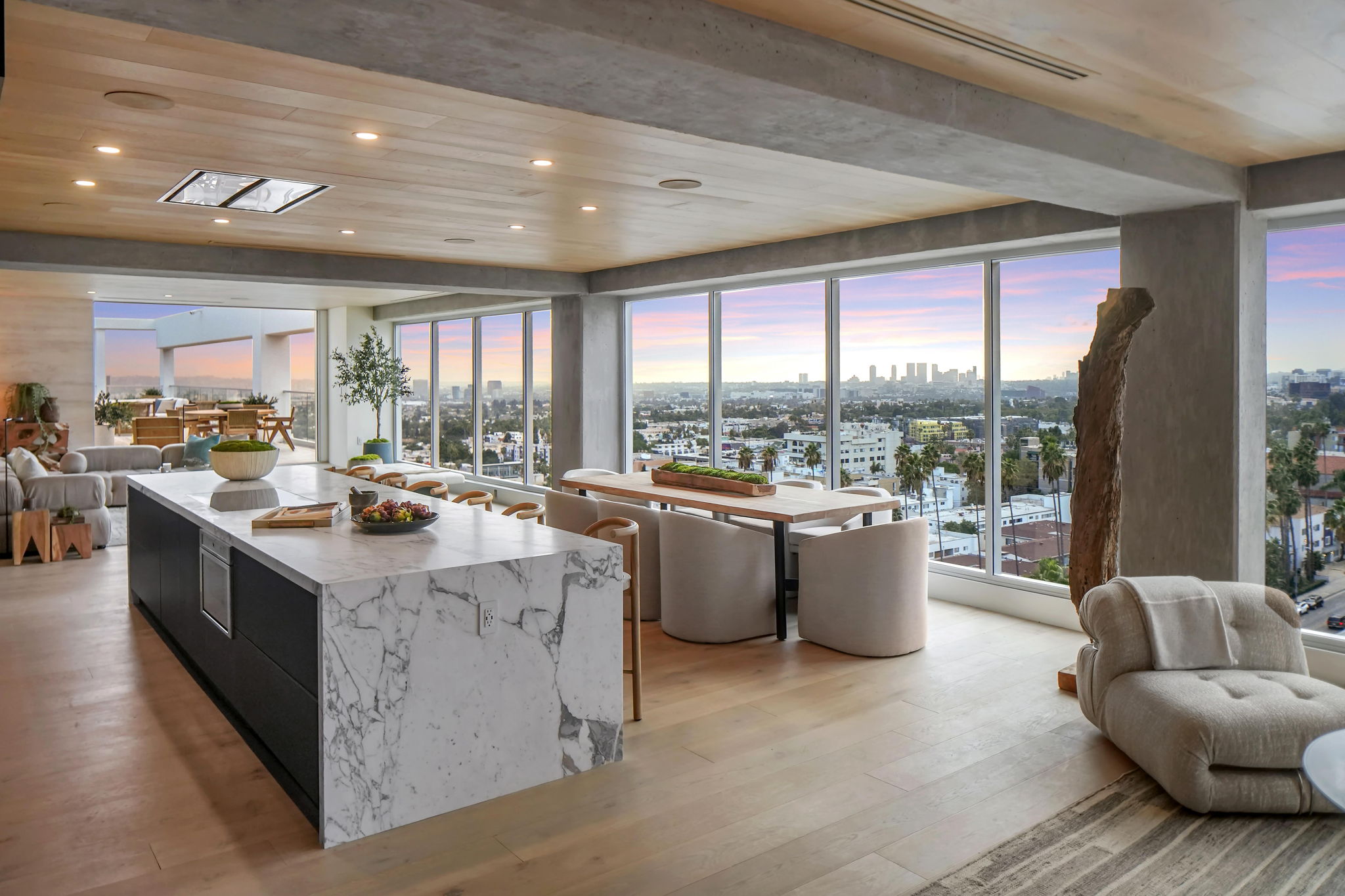 Modern event space in Hills Penthouse, West Hollywood with city views and elegant seating.