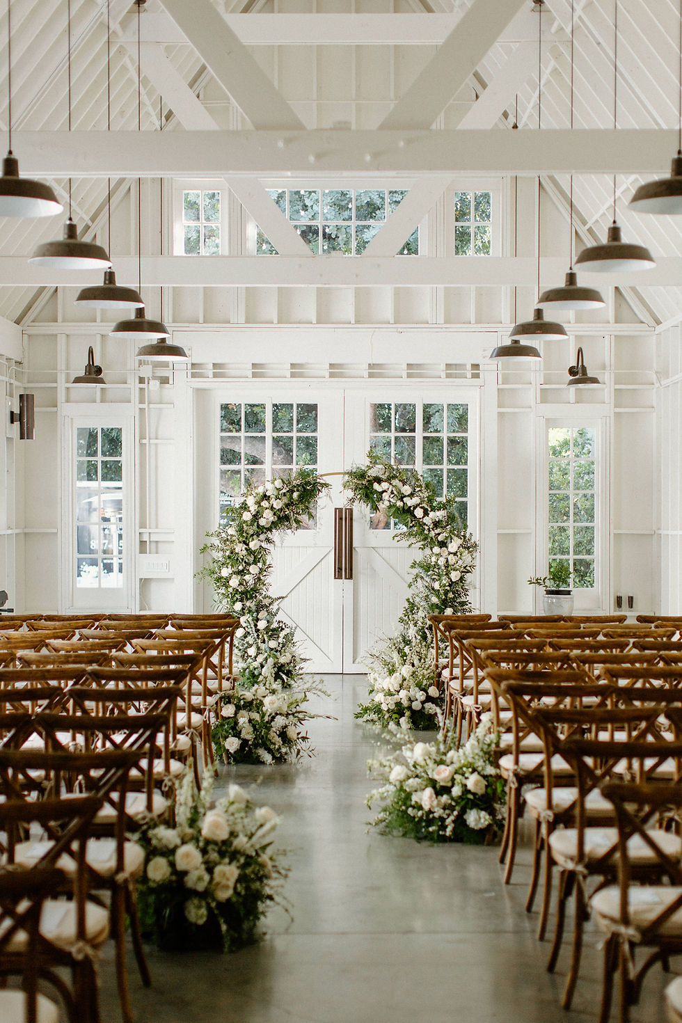 Elegant Lombardi House event space with floral decor, ideal for weddings and gatherings.