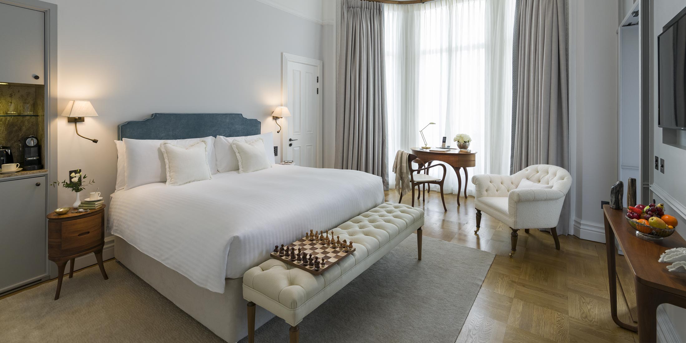 Elegant hotel suite at The Adria, perfect for executive retreats and meetings.
