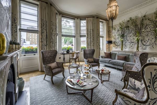 Elegant meeting space in The Adria with plush seating for corporate events.