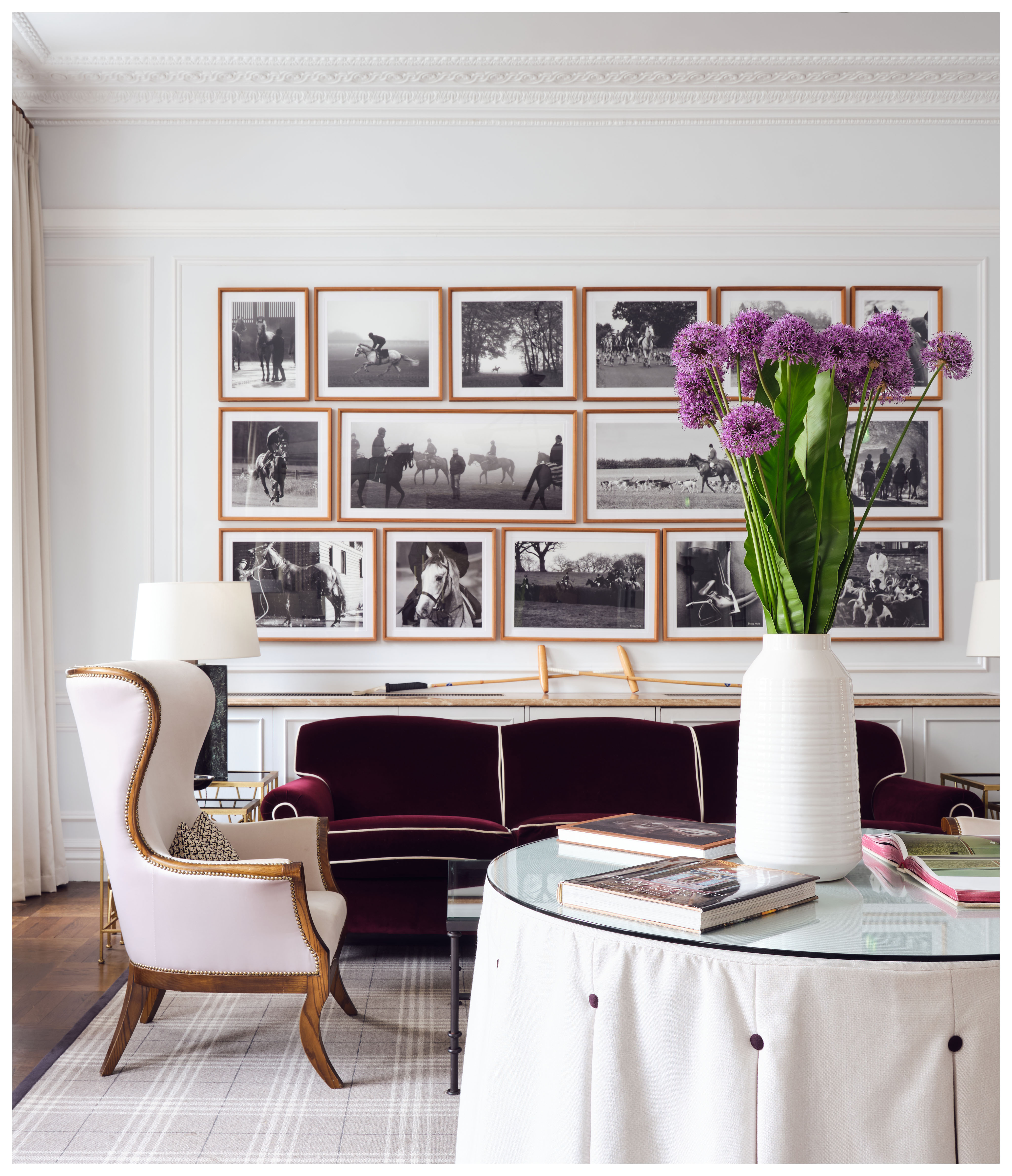 Elegant lounge with stylish seating and gallery wall, perfect for networking events.