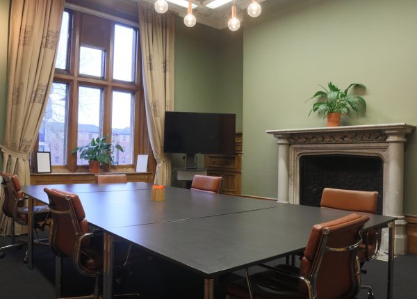Brunel's Boardroom with sleek table, ideal for meetings and strategic planning.