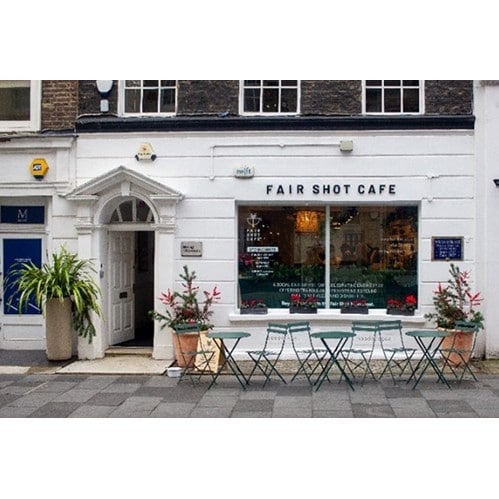 Charming Fair Shot Cafe with outdoor seating, perfect for networking events and casual meetings.