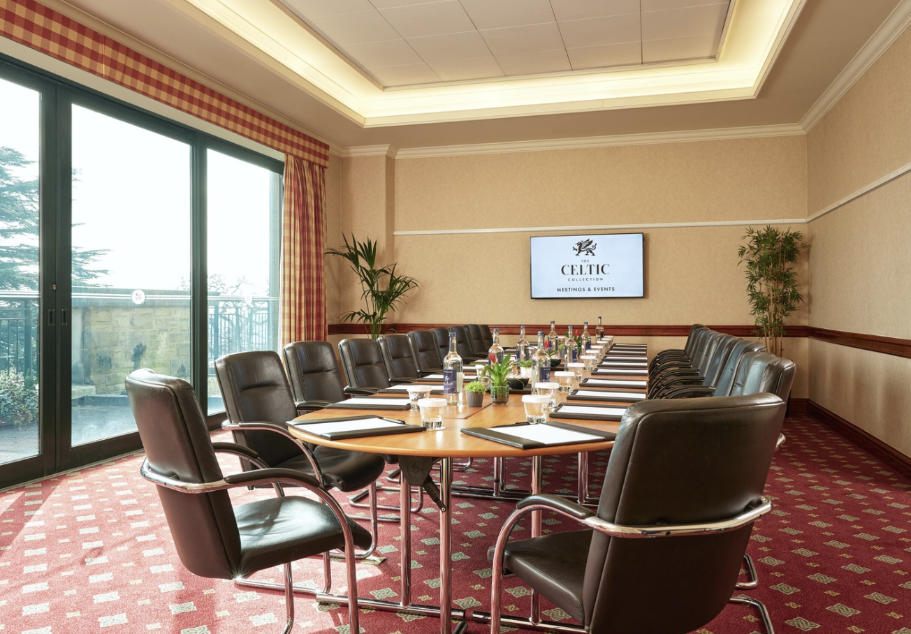 Whole Venue meeting room with circular table, ideal for professional gatherings and events.