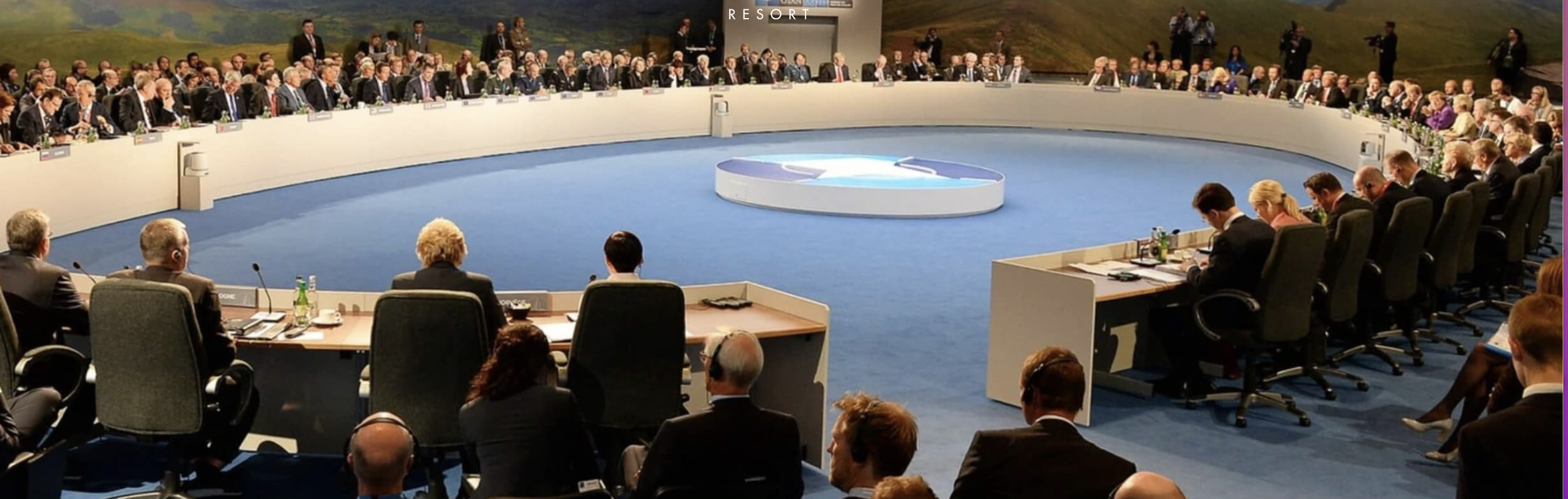 Whole Venue in Celtic Mannon, circular seating for high-profile conference meeting.