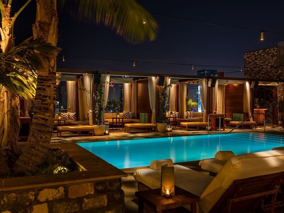 Stylish rooftop pool at The Highlight Room, perfect for evening events and gatherings.