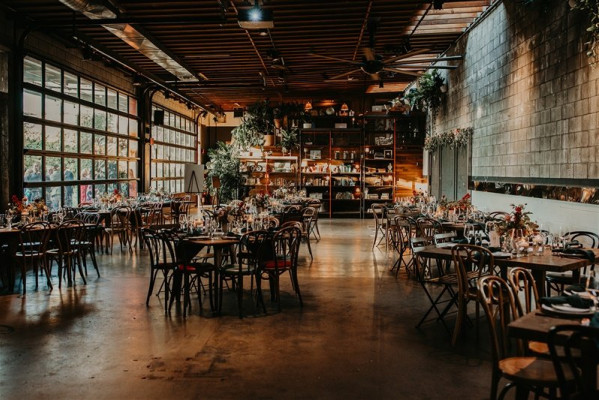 Grand Hall at SmogShoppe: rustic decor, ideal for intimate gatherings and upscale dining.