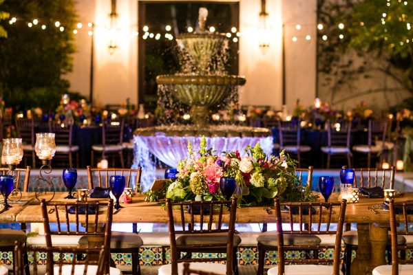 Elegant outdoor dining at Los Angeles River Center with fountain, ideal for weddings.