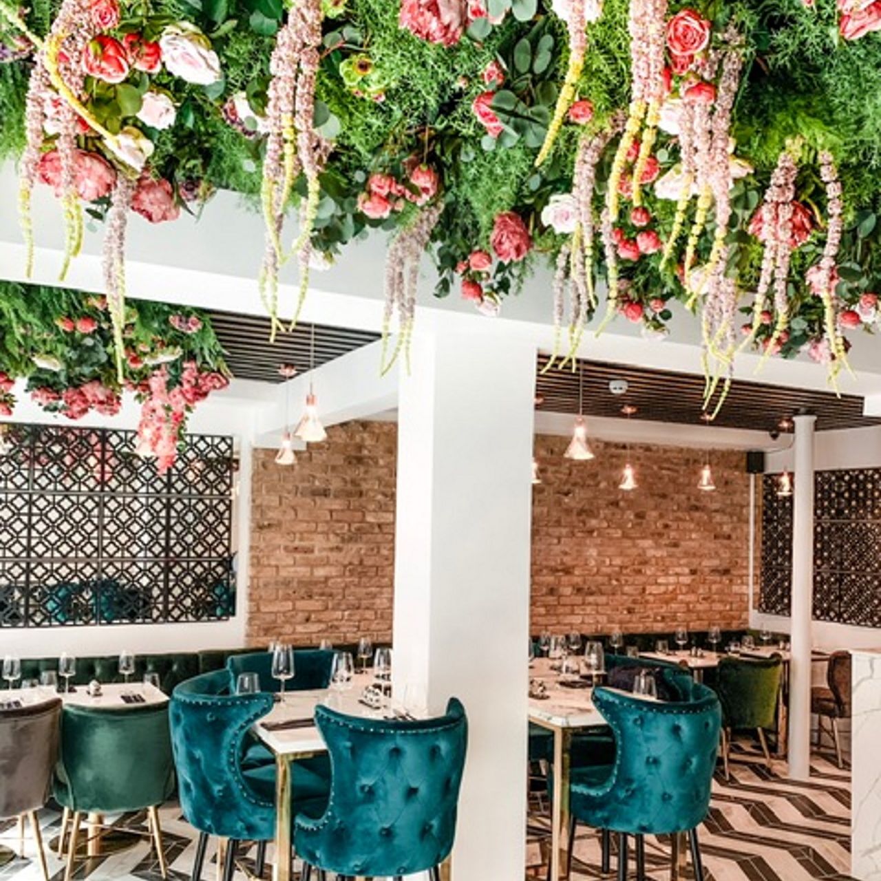 Elegant Eli's Restaurant with lush floral decor, perfect for upscale events and gatherings.