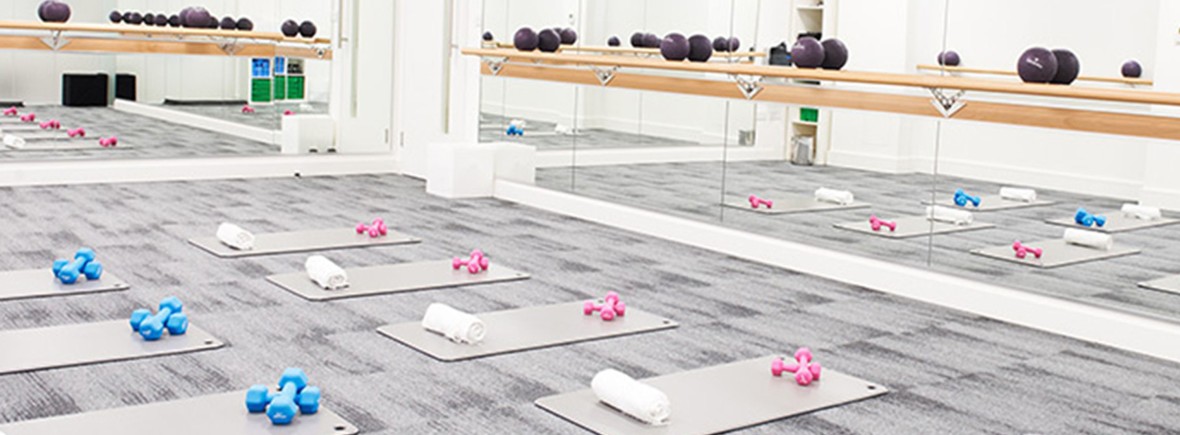 Barrecore Kensington fitness studio with exercise mats, ideal for wellness events.