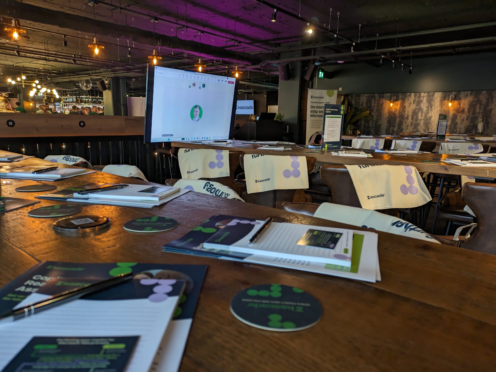 Darts Area in Par 59 Bristol: modern meeting space with long table and presentation screen.