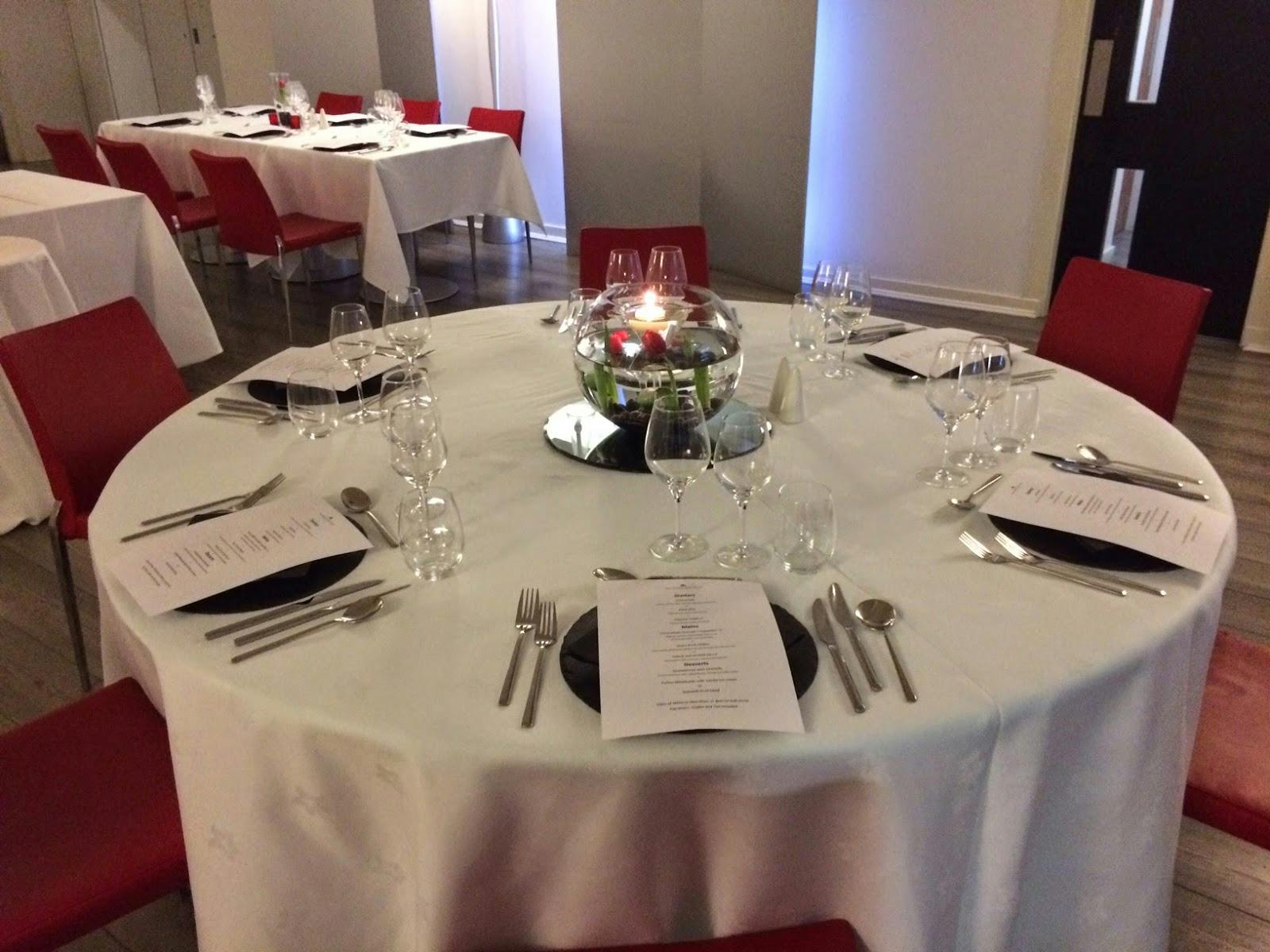Elegant dining table setup at The Queen's Gate Hotel for corporate events and dinners.